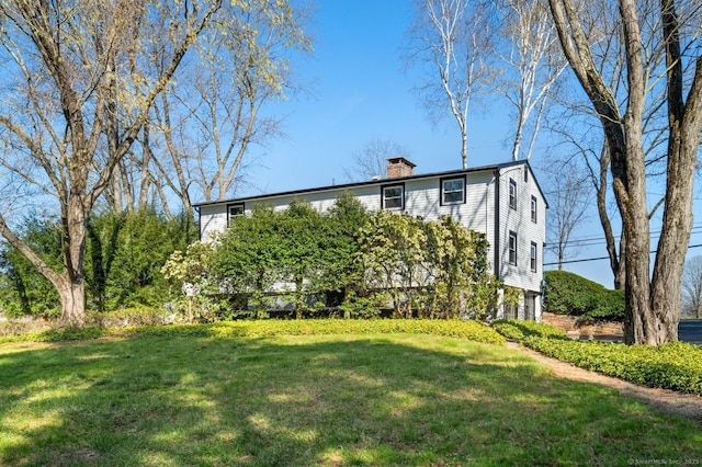 689 S Meriden Rd, Cheshire, CT 06410 - view of front of property with a chimney and a front lawn