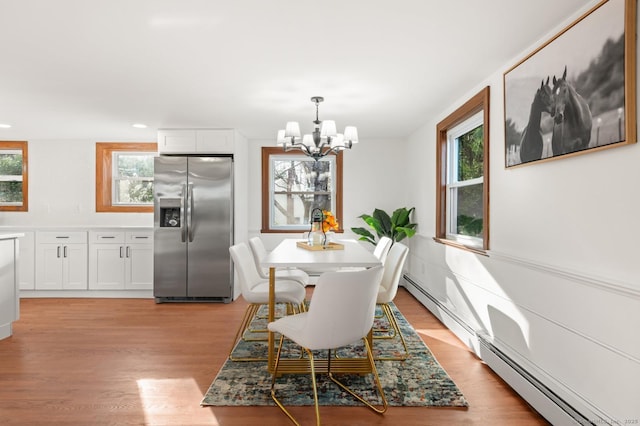 689 S Meriden Rd, Cheshire, CT 06410 - dining room with a chandelier, a baseboard radiator, healthy amount of natural light, light wood-style floors, and recessed lighting