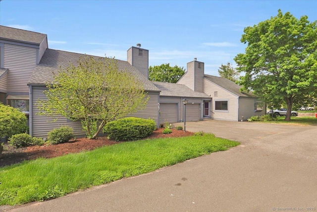 547 Pilgrim Hbr Unit 547, Wallingford, CT 06492 - view of front of home with an attached garage and driveway