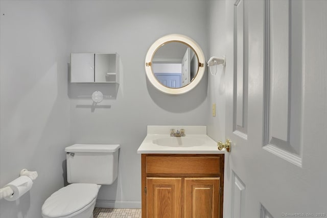 547 Pilgrim Hbr Unit 547, Wallingford, CT 06492 - bathroom with toilet, vanity, baseboards, and tile patterned flooring