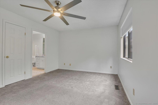 547 Pilgrim Hbr Unit 547, Wallingford, CT 06492 - unfurnished bedroom with light carpet, baseboards, ensuite bathroom, and ceiling fan