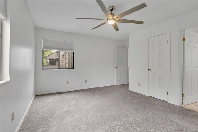 547 Pilgrim Hbr Unit 547, Wallingford, CT 06492 - unfurnished bedroom with carpet, baseboards, and a ceiling fan
