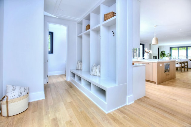 158 Compo Rd N, Westport, CT 06880 - mudroom with light wood finished floors and baseboards