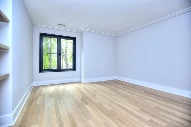 158 Compo Rd N, Westport, CT 06880 - spare room with light wood-style floors, baseboards, and ornamental molding