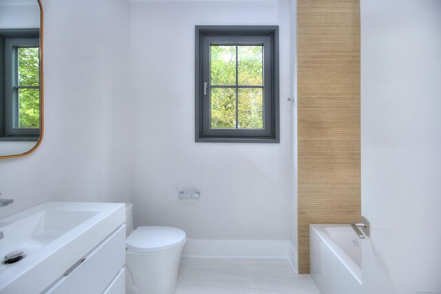 158 Compo Rd N, Westport, CT 06880 - full bath featuring vanity, a tub, healthy amount of natural light, and toilet