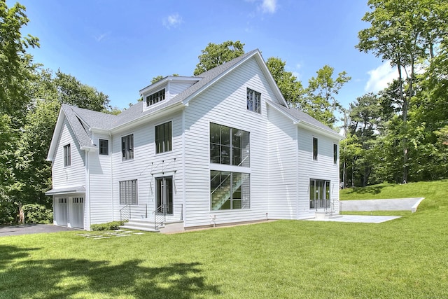 158 Compo Rd N, Westport, CT 06880 - back of property with a garage, driveway, a yard, and roof with shingles