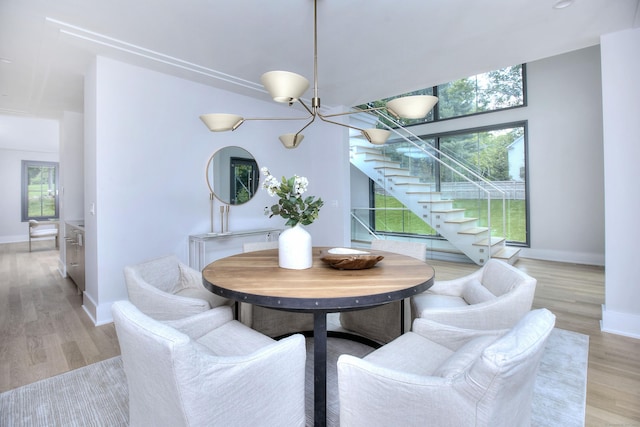158 Compo Rd N, Westport, CT 06880 - dining area featuring stairs, light wood finished floors, and baseboards