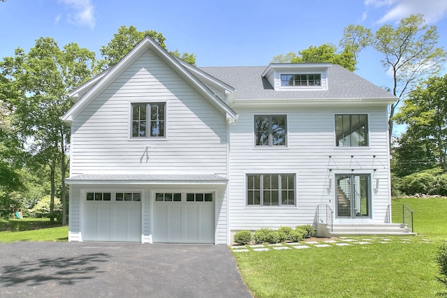 158 Compo Rd N, Westport, CT 06880 - view of front facade featuring driveway, a front lawn, a shingled roof, and an attached garage