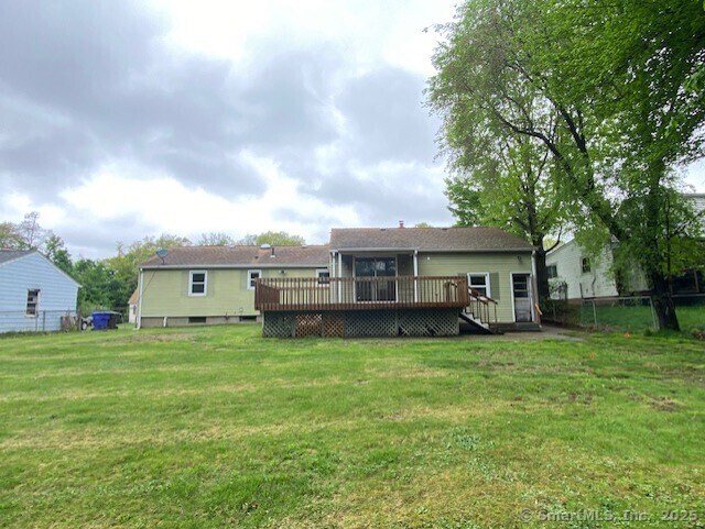 147 Chester St, East Hartford, CT 06108 - back of property with a wooden deck