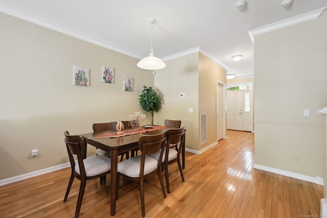 20 Goodwin Cir Unit 20, Hartford, CT 06105 - dining space featuring baseboards, light wood-style floors, and ornamental molding