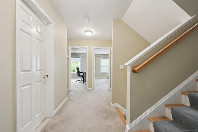 20 Goodwin Cir Unit 20, Hartford, CT 06105 - hallway featuring light carpet, stairway, and baseboards