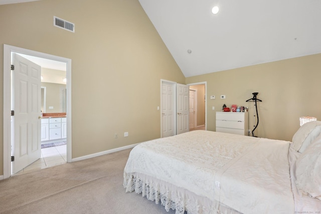 20 Goodwin Cir Unit 20, Hartford, CT 06105 - bedroom featuring high vaulted ceiling, light carpet, baseboards, and ensuite bathroom