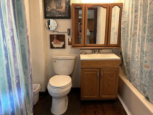 2060 Perkins St, Bristol, CT 06010 - bathroom featuring toilet, wood-type flooring, vanity, a textured wall, and shower / bath combination with curtain