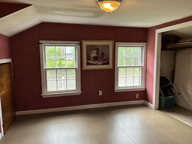 2060 Perkins St, Bristol, CT 06010 - unfurnished bedroom with multiple windows, vaulted ceiling, and a closet