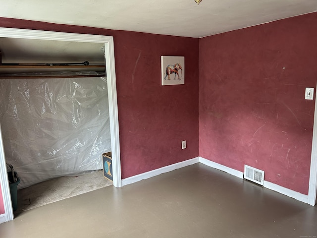 2060 Perkins St, Bristol, CT 06010 - spare room featuring finished concrete floors and baseboards