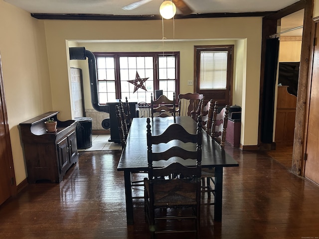 2060 Perkins St, Bristol, CT 06010 - dining space with dark wood-style flooring and baseboards