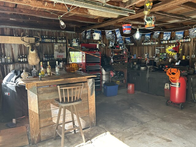 2060 Perkins St, Bristol, CT 06010 - basement featuring a workshop area and a dry bar