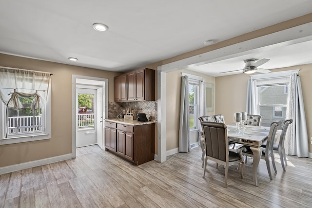 24 High St, West Haven, CT 06516 - dining space with light wood-style flooring, baseboards, and ceiling fan