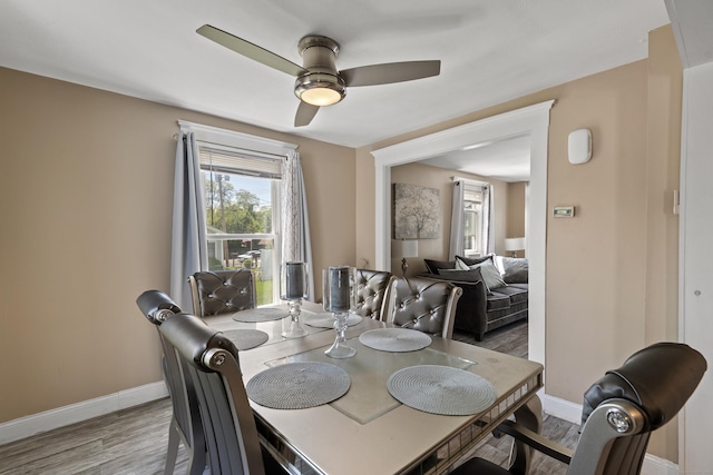 24 High St, West Haven, CT 06516 - dining area featuring ceiling fan, baseboards, and wood finished floors
