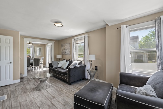 24 High St, West Haven, CT 06516 - living room featuring baseboards and light wood-type flooring