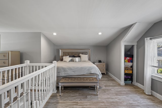 24 High St, West Haven, CT 06516 - bedroom featuring wood finished floors, recessed lighting, lofted ceiling, and baseboards