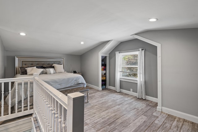 24 High St, West Haven, CT 06516 - bedroom with vaulted ceiling, recessed lighting, wood finished floors, and baseboards