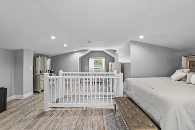 24 High St, West Haven, CT 06516 - bedroom with light wood-style floors, vaulted ceiling, baseboards, and recessed lighting