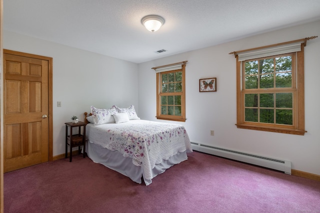 67 Blue Heron Dr, East Hampton, CT 06424 - carpeted bedroom featuring baseboard heating and baseboards