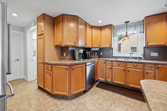 kitchen with a sink, dishwasher, light tile patterned flooring, decorative backsplash, and recessed lighting
