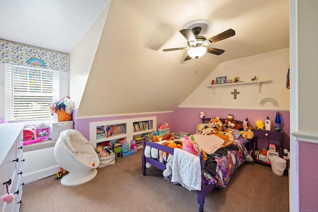carpeted bedroom with lofted ceiling and a ceiling fan