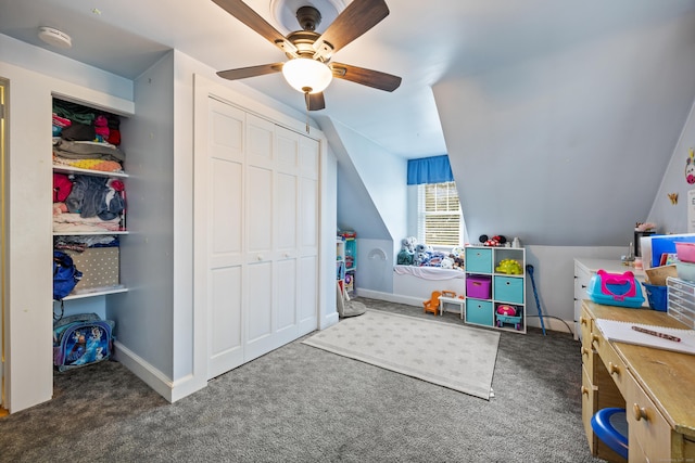 playroom with carpet floors, ceiling fan, vaulted ceiling, and baseboards