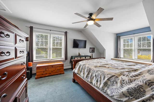 carpeted bedroom featuring a baseboard heating unit, multiple windows, and a ceiling fan