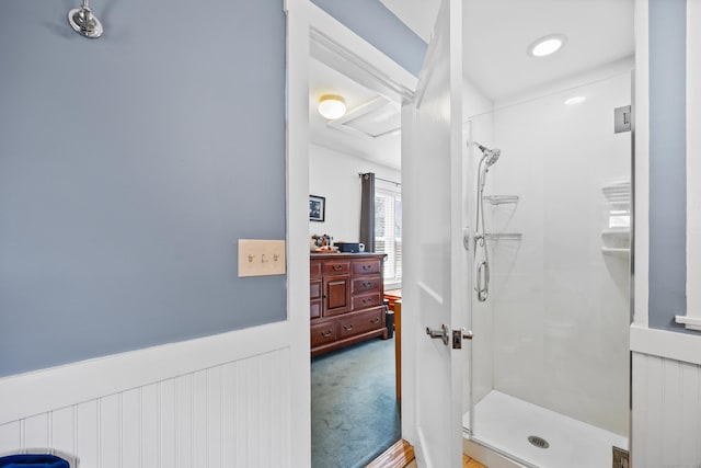 bathroom featuring a shower stall and vanity