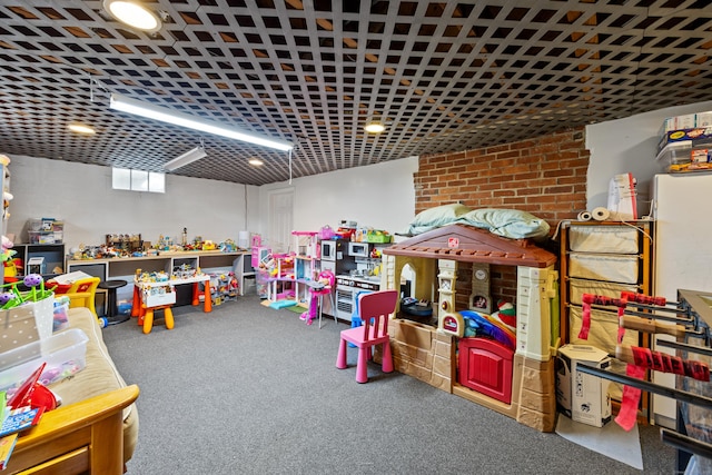 recreation room with carpet flooring