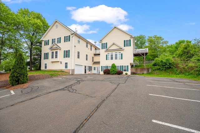 8 Pasco Dr Unit E, East Windsor, CT 06088 - view of property featuring uncovered parking