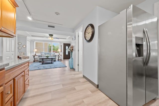 8 Pasco Dr Unit E, East Windsor, CT 06088 - kitchen featuring stainless steel fridge with ice dispenser, ceiling fan, baseboards, light stone countertops, and open floor plan