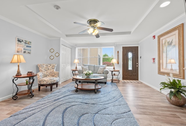8 Pasco Dr Unit E, East Windsor, CT 06088 - living room featuring a raised ceiling, a ceiling fan, baseboards, and wood finished floors