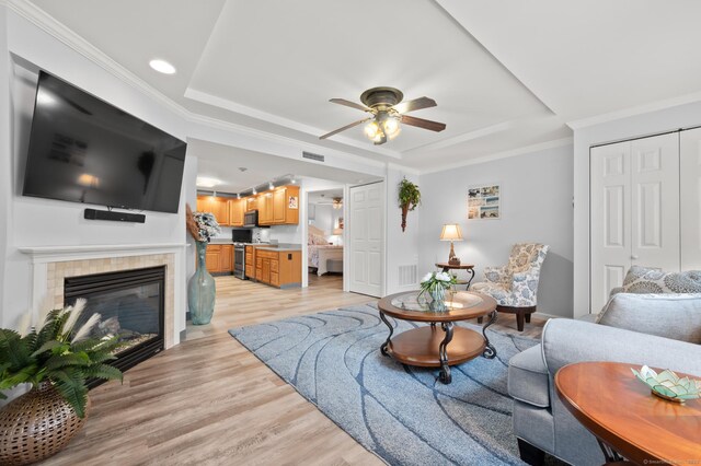 8 Pasco Dr Unit E, East Windsor, CT 06088 - living room with a tray ceiling, ceiling fan, light wood-type flooring, recessed lighting, and baseboards