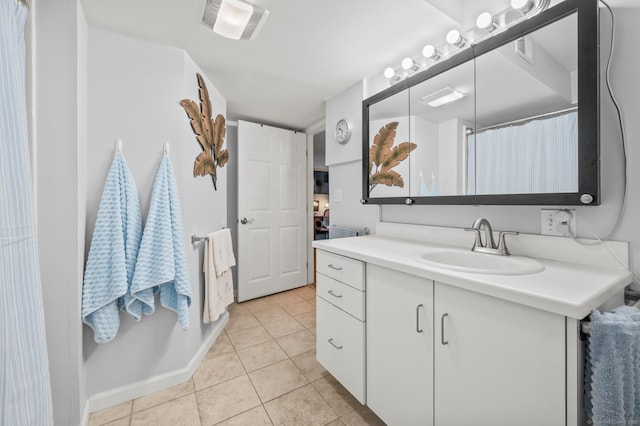 8 Pasco Dr Unit E, East Windsor, CT 06088 - bathroom featuring tile patterned floors, vanity, and baseboards