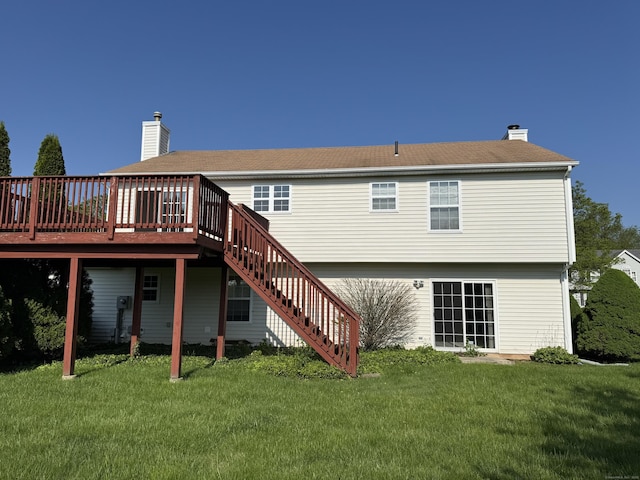 26 John George Dr, Meriden, CT 06450 - back of house featuring stairs, a wooden deck, a chimney, and a lawn