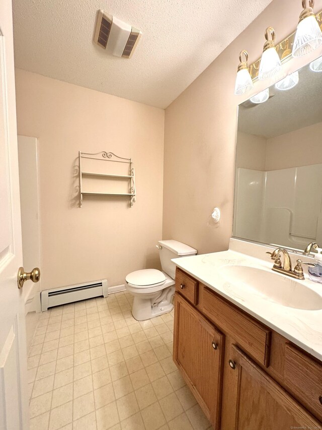 26 John George Dr, Meriden, CT 06450 - bathroom with baseboard heating, toilet, vanity, a textured ceiling, and a shower