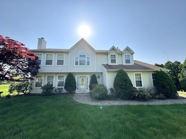 26 John George Dr, Meriden, CT 06450 - view of front facade with a front lawn and a chimney