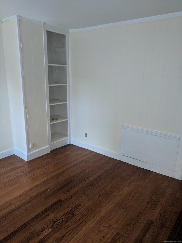 61 Williams St, Norwich, CT 06360 - spare room with baseboards and dark wood-style flooring