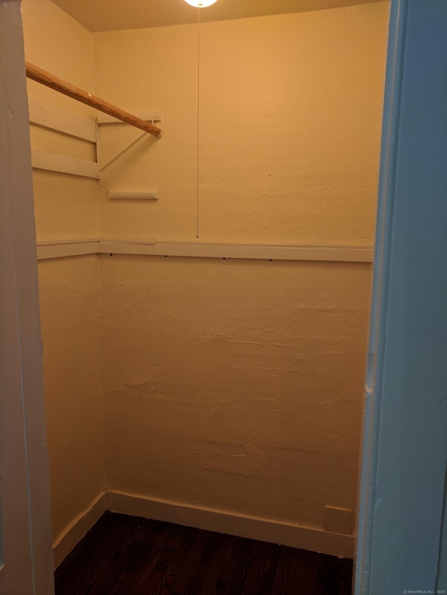 61 Williams St, Norwich, CT 06360 - walk in closet with dark wood-style floors
