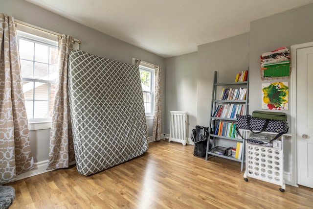 61 Williams St, Norwich, CT 06360 - misc room featuring radiator heating unit, wood finished floors, and baseboards