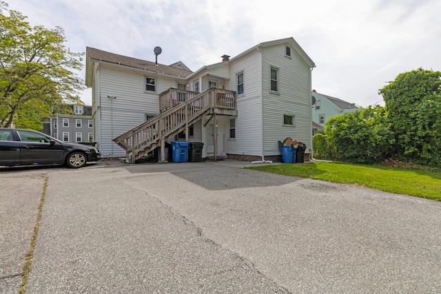 61 Williams St, Norwich, CT 06360 - back of house featuring stairway and a deck
