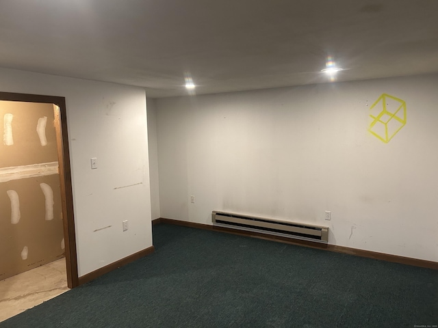 21 Oak Avenue Ext Unit 2, Torrington, CT 06790 - below grade area with a baseboard heating unit, carpet, and baseboards