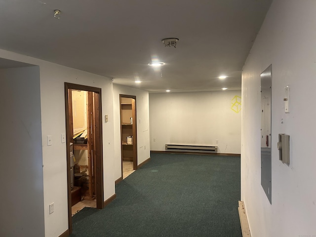21 Oak Avenue Ext Unit 2, Torrington, CT 06790 - basement with a baseboard radiator, carpet, and baseboards