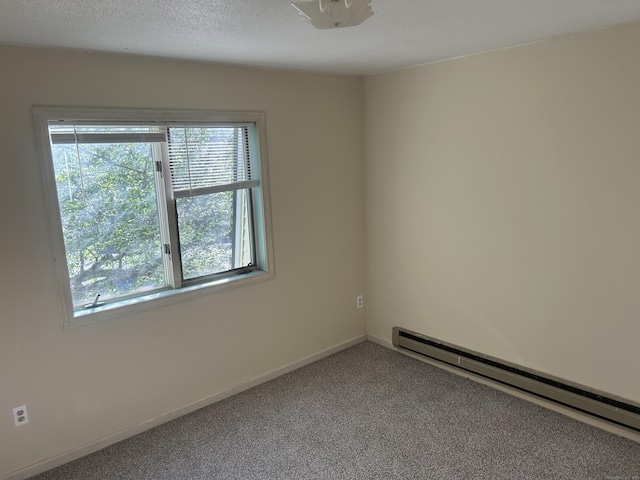 21 Oak Avenue Ext Unit 2, Torrington, CT 06790 - carpeted empty room with baseboard heating and baseboards