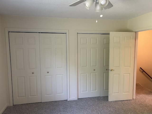 21 Oak Avenue Ext Unit 2, Torrington, CT 06790 - unfurnished bedroom with carpet floors, two closets, and a ceiling fan